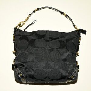 Coach Karley Arch Purse (Model J0773–10620) in Black with Signature C Pattern.